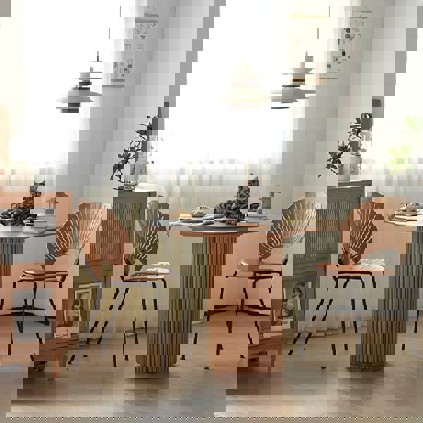 Detail view of Cane Round Dining Table, Oak with narrow dining table