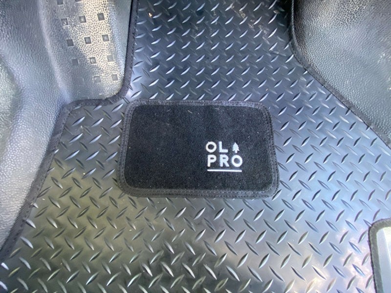 VW T5/T6 Rubber Cab Mat OLPRO pictured on the drivers side with carpet padded heal rest.