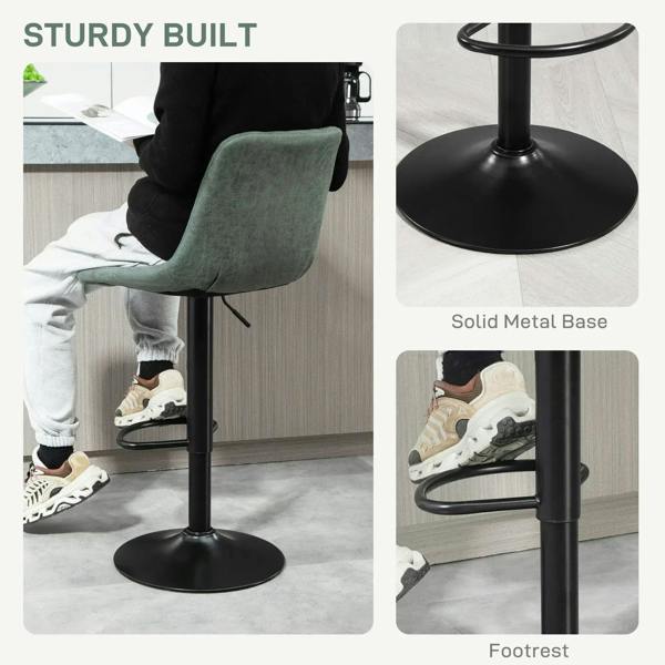 Green bar stool with sturdy metal base and round footrest, tufted seat and back