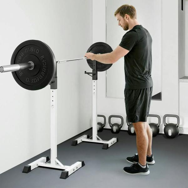 Black barbell squat stand rack with spotter arms, tall uprights, and stable base