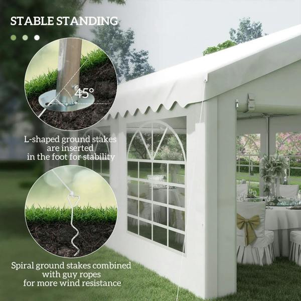 White gazebo with ground stakes and rope tie-downs for stability in wind