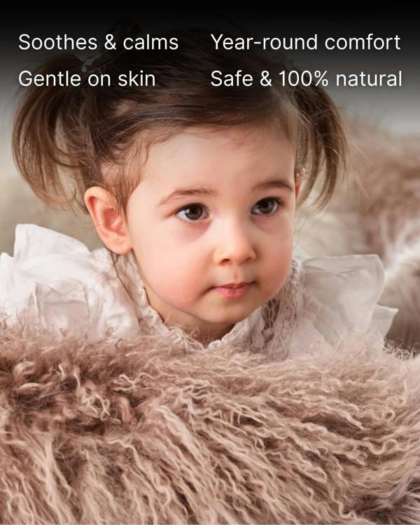 Mocha mongolian sheepskin pillow wth baby