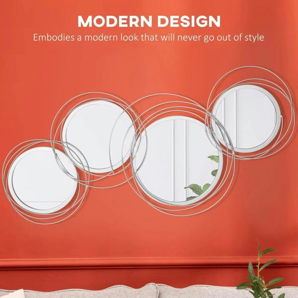 Silver circular wall mirror set with five round mirrors and chrome-like ring frames