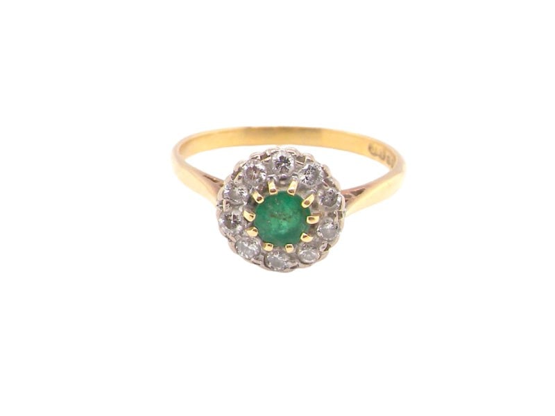 Vintage Tom A vintage Emerald and Diamond cluster ring