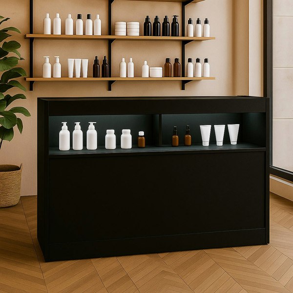 Sleek black LED retail shop counter B1500 with illuminated shelves, displaying various bottles against a modern interior backdrop