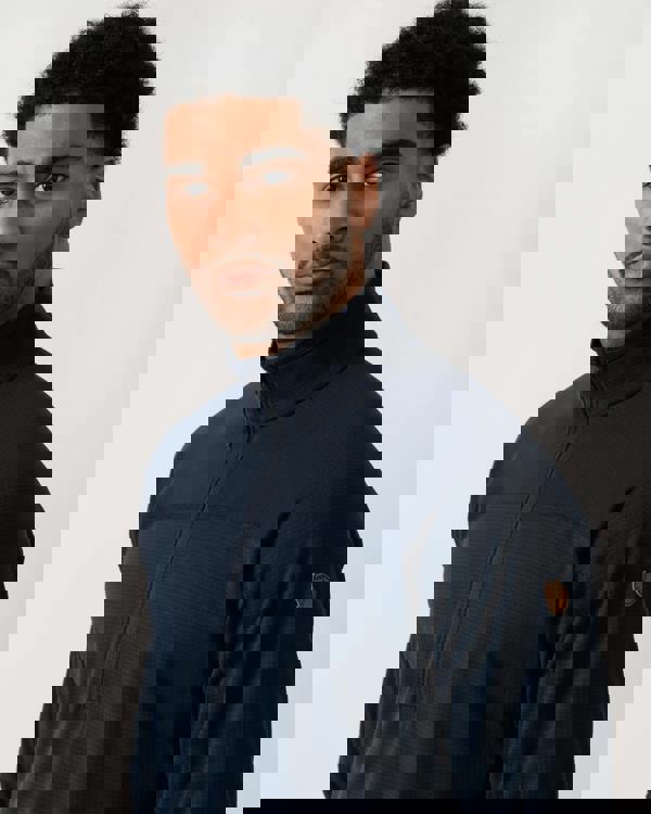 close up shot of a model wearing a Fjallraven Abisko Lite Fleece Half Zip Mens Sweatshirt in Dark Navy 555