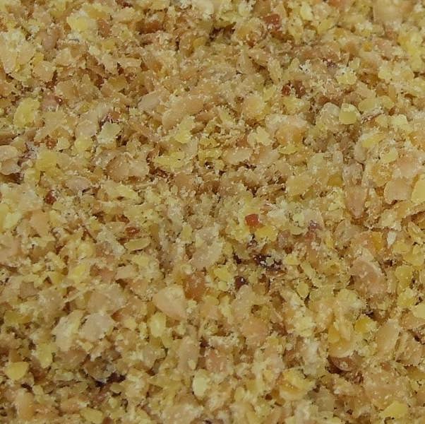 Ground golden flaxseed close-up
