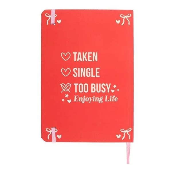 Red A5 notebook with centered “Taken Single Too Busy Enjoying Life” title text
