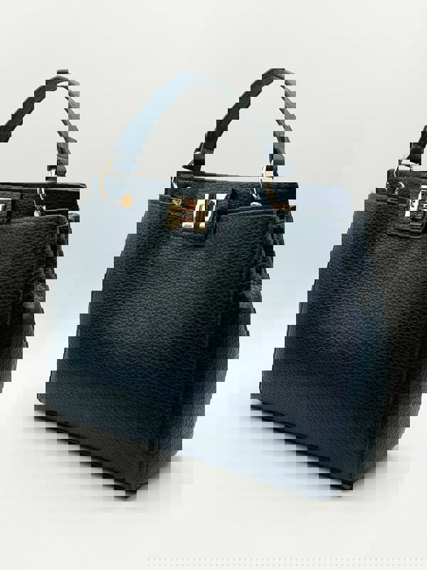 SVNX Black faux leather handbag with gold trim