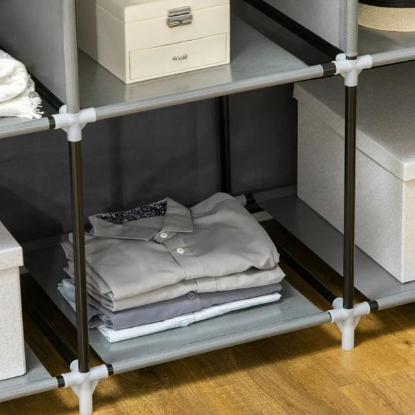 Dark grey fabric wardrobe lower shelf with folded shirts and storage bins