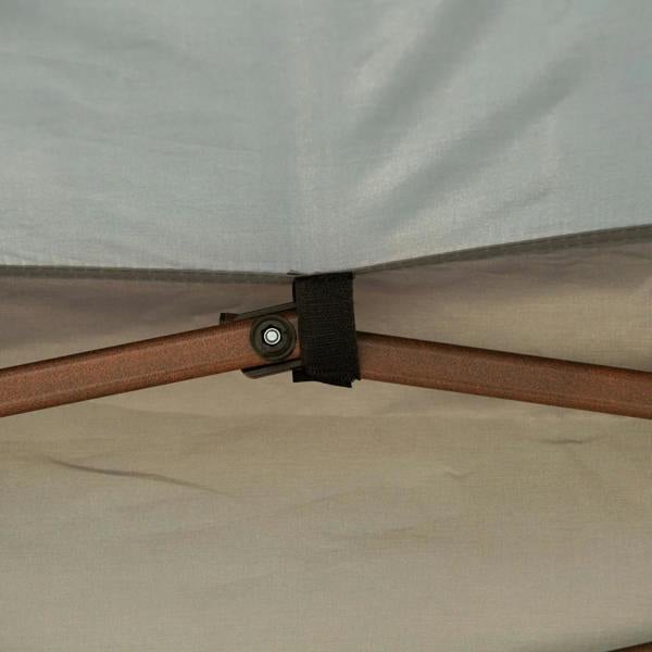 Close-up of gazebo roof corner with strap fastener secured to frame
