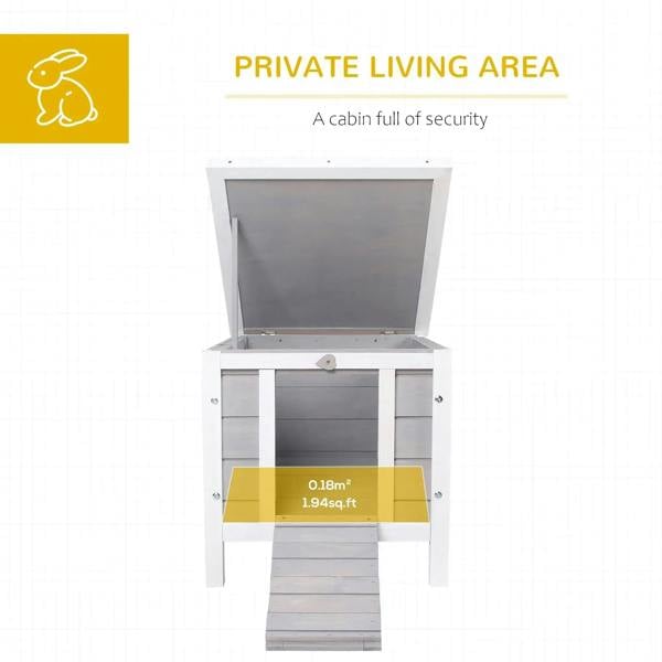 Grey wooden small animal hutch with open roof and ramp at front entry