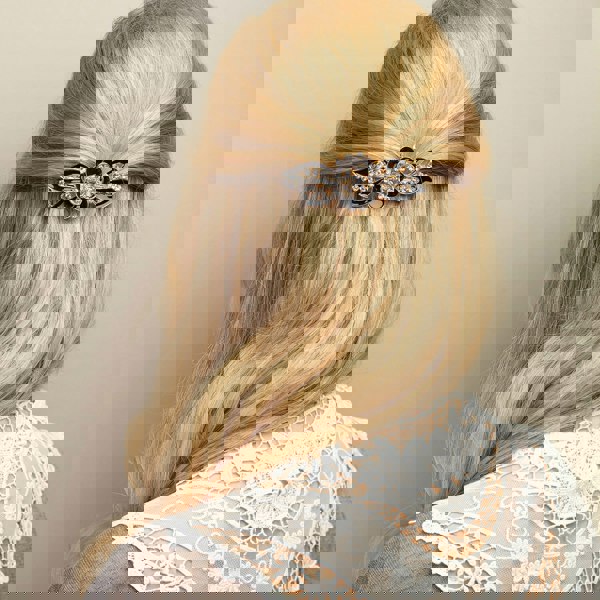 flower hair clip in black half up half down hair