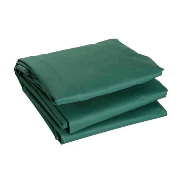 Folded dark green rectangular outdoor furniture cover in stacked layers