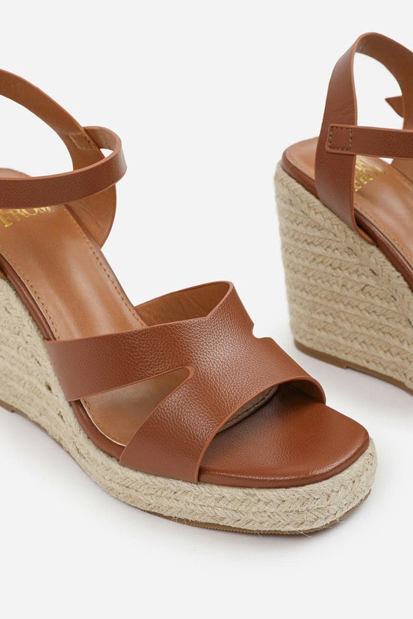 Where's That From Sansa Wide Fit Cut Out Strap Detail Wedge Shoes With Buckle Closure in Tan Grain Pu