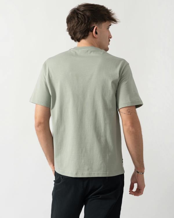 back shot of a model wearing a Aquascutum Mens Small Logo T-Shirt in Salvia 34