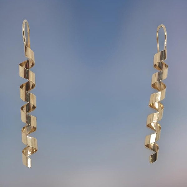 Vintage Tom A pair of long drop 'spring' drop earrings