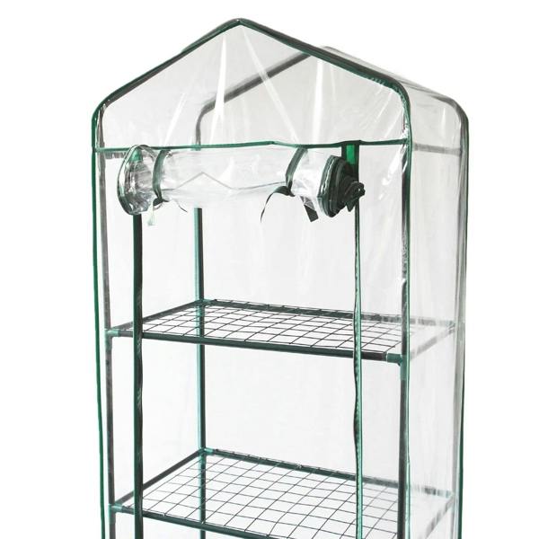 Mini greenhouse with four tiers, clear plastic cover, metal frame, and open top for ventilation, ideal for indoor gardening