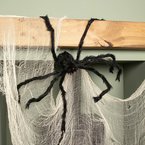 Samuel Alexander 90cm Black Furry Halloween Spider Decoration with Extendable Legs and Red Eyes