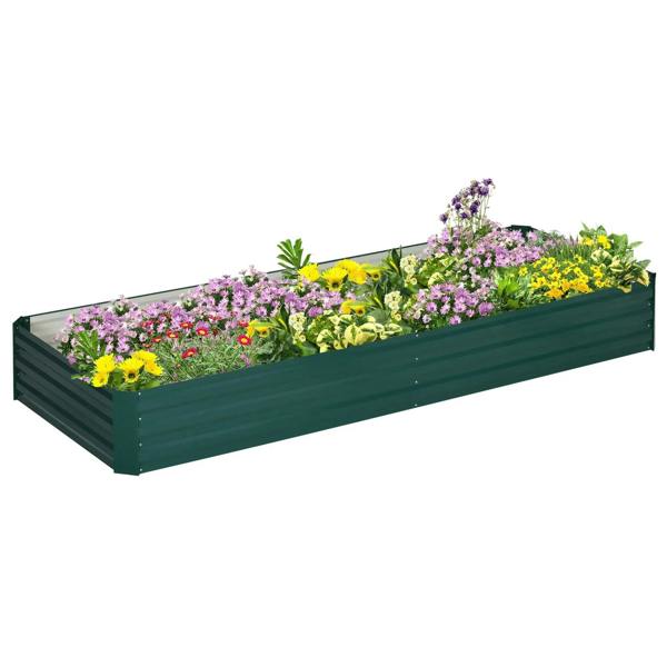 Green metal raised garden bed planter box filled with colorful flowers
