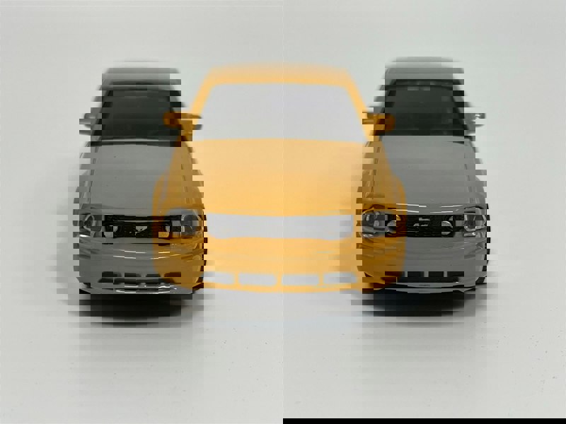Burago 2006 Ford Mustang GT Orange 1:43 Scale - 183000