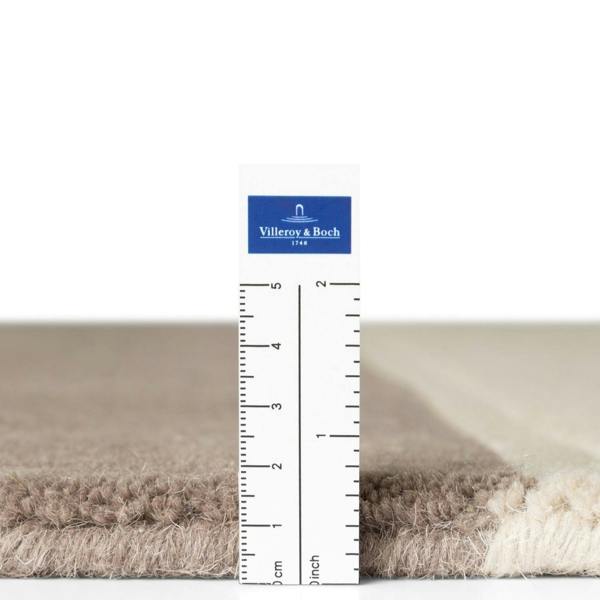 Pure wool rug, cream brown colours, soft durable pile, cotton backing, simple care, ideal for busy homes.