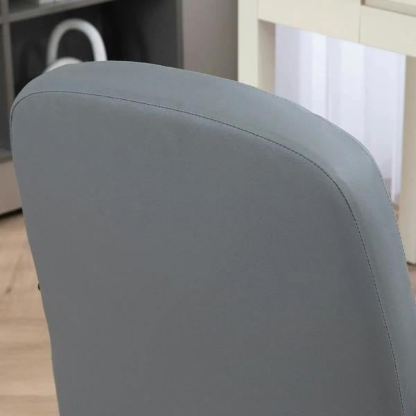 Close-up of grey padded chair back with smooth PU leather upholstery