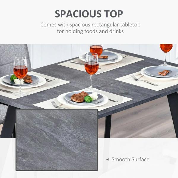 Charcoal grey rectangular dining table with smooth tabletop surface and metal legs