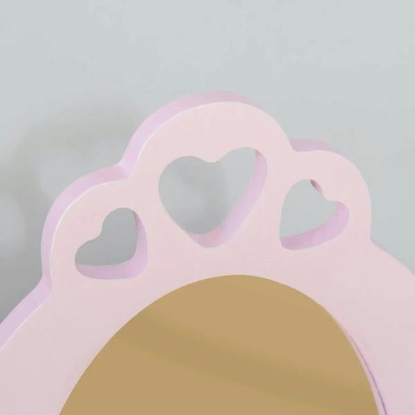 Pink decorative top of vanity mirror with heart cutouts