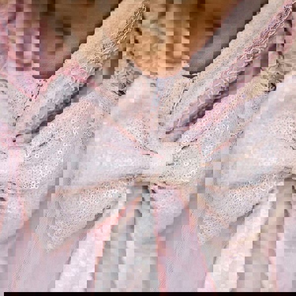 sequin bow on girls flower Gil dress