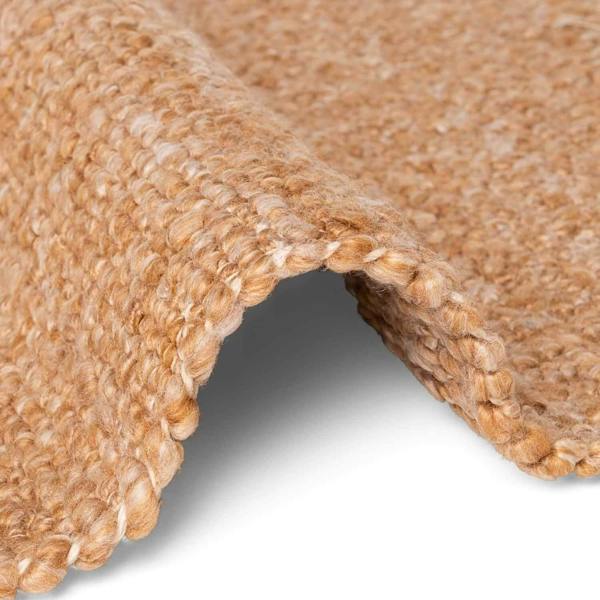 Close-up of a textured brown carpet