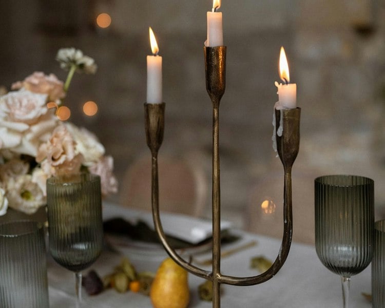 Rustic Antique Trident Brass Candelabra in gold from What a Host Home