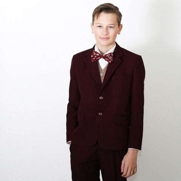 Boy wearing 5 piece suit