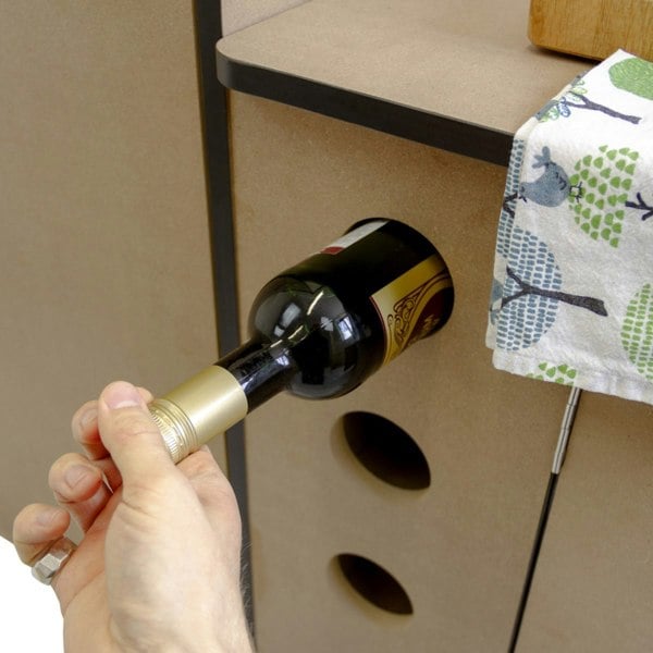 MDF Camper Van Kitchen Unit LHD featuring a wine bottle holder, sleek design, and colorful patterned towel for added style