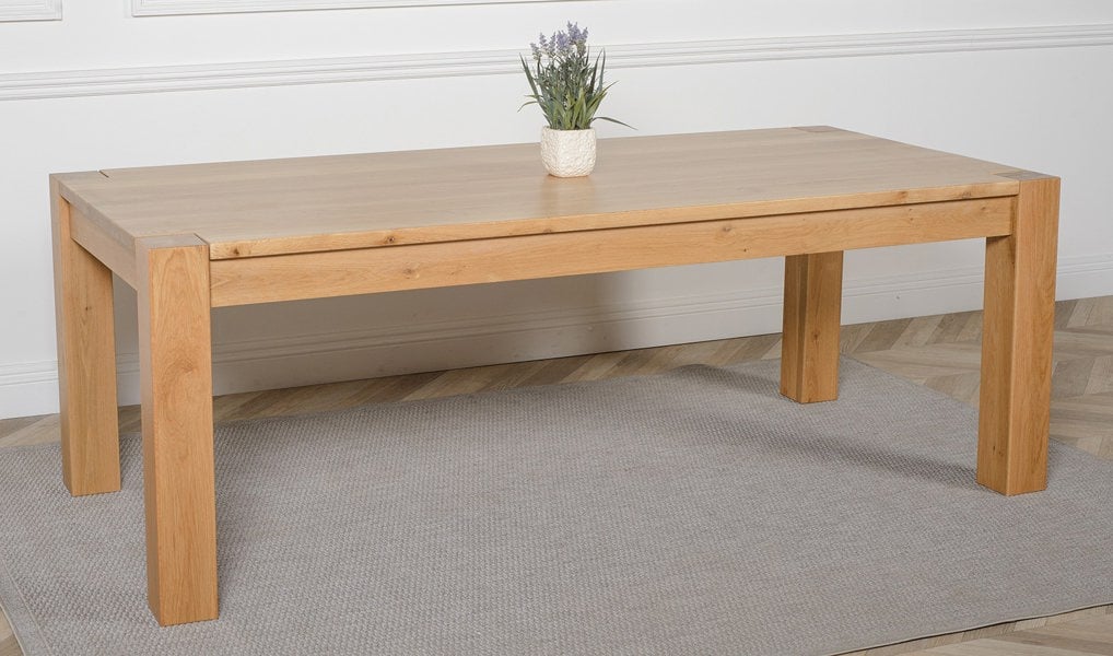 That's Furniture Kuba Extra Large Oak Dining Table with Montana Leather Chairs