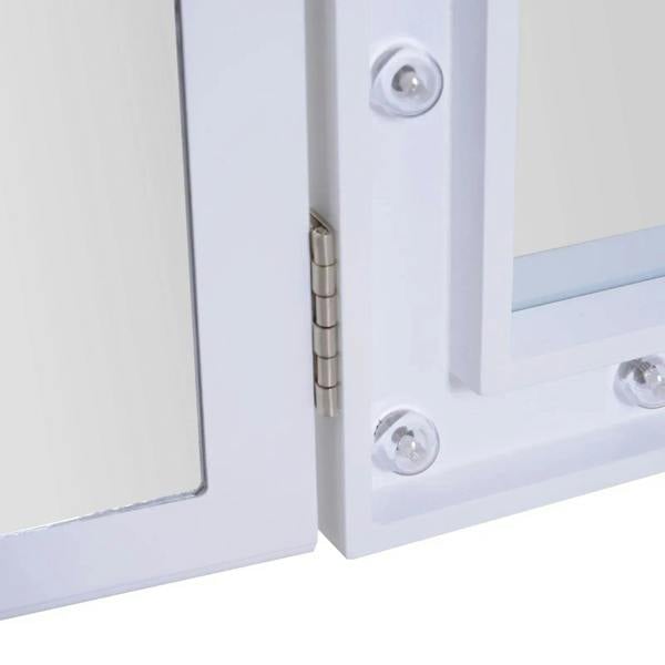 Close-up of white tri-fold mirror hinge with metal hinges and LED bulb base on frame