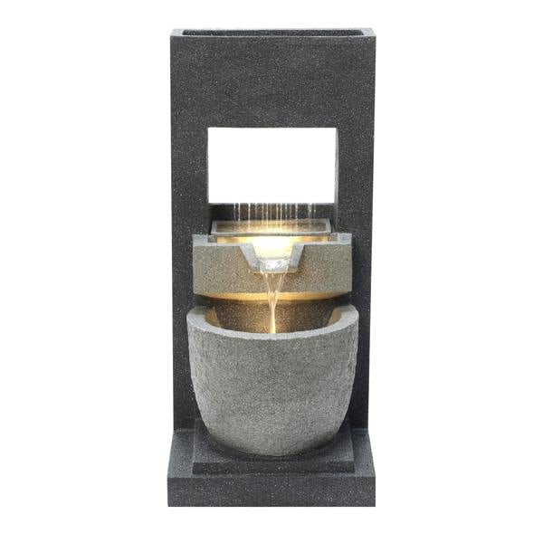 Elegant electric water feature with cascading water, featuring textured gray stone and a sleek modern design, perfect for outdoor decor