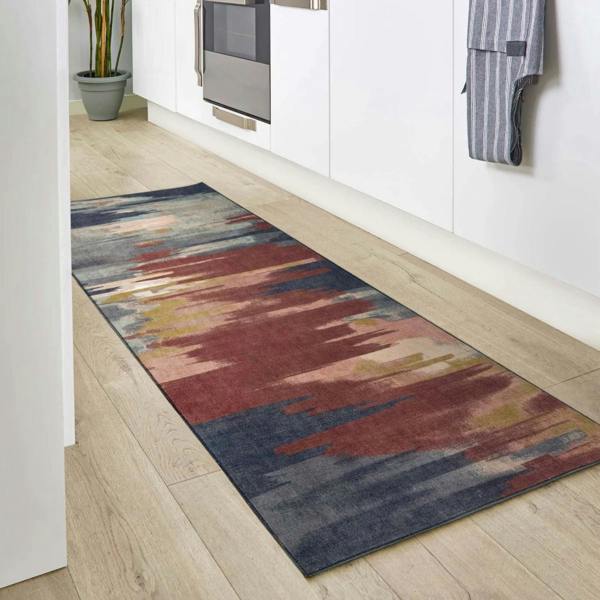 Colorful runner rug on a wooden floor in a kitchen setting