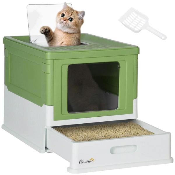 Light green hooded cat litter box with front entry window and included scoop, cat looking out