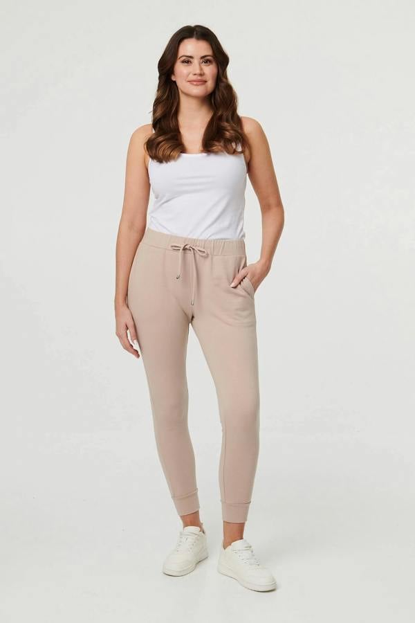 Stone | Adjustable Drawstring Waist Slim Joggers : Model is 5'9"/175 cm and wears UK10/EU38/US6/AUS10