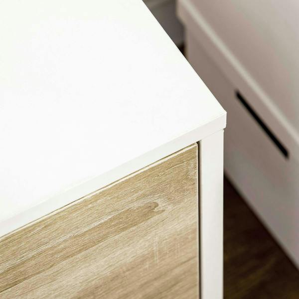 TV stand cabinet close-up of white top edge and natural wood-effect side panel.