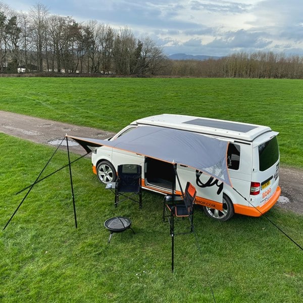 An above image of the Modern Shade Canopy from OLPRO attached to a Volkswagen Camper Van.