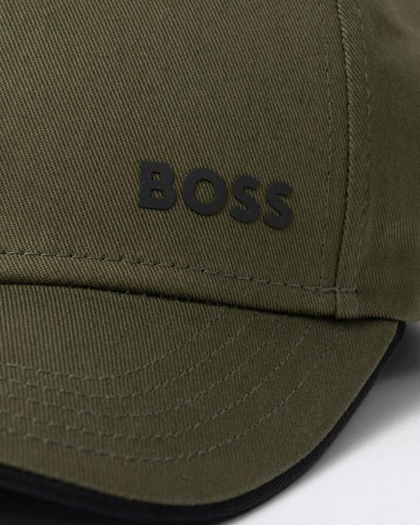 logo detail of a BOSS Green Bold Mens Logo-Print Cap In Cotton Twill in Open Green 398