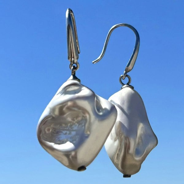 Silver tones shell earrings by LENAE London, boho style.