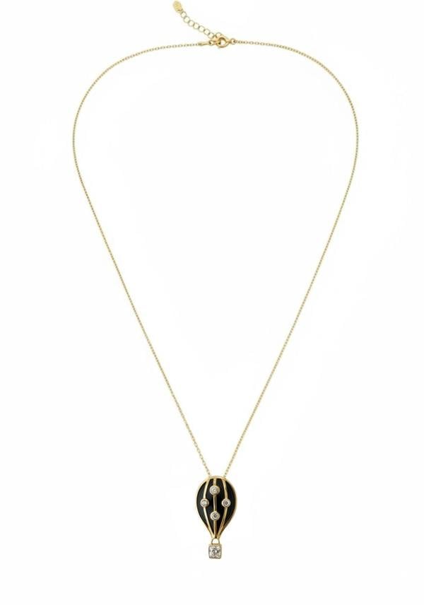 Gold hot air balloon pendant necklace on a white background