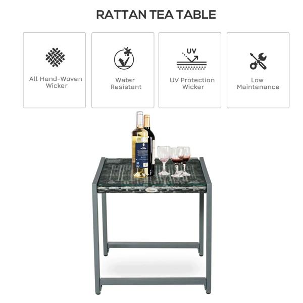Grey rattan tea table with dark glass top, bottle and wine glasses on surface