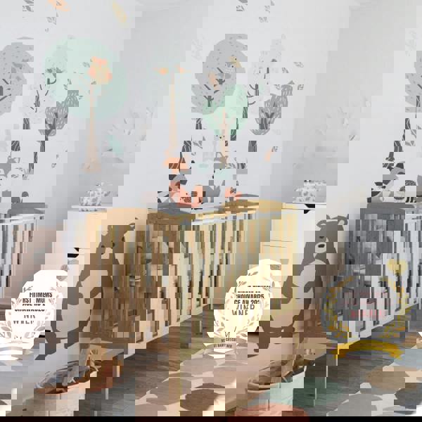 award badge - best baby cot - waffi mini space saver cot with drop side