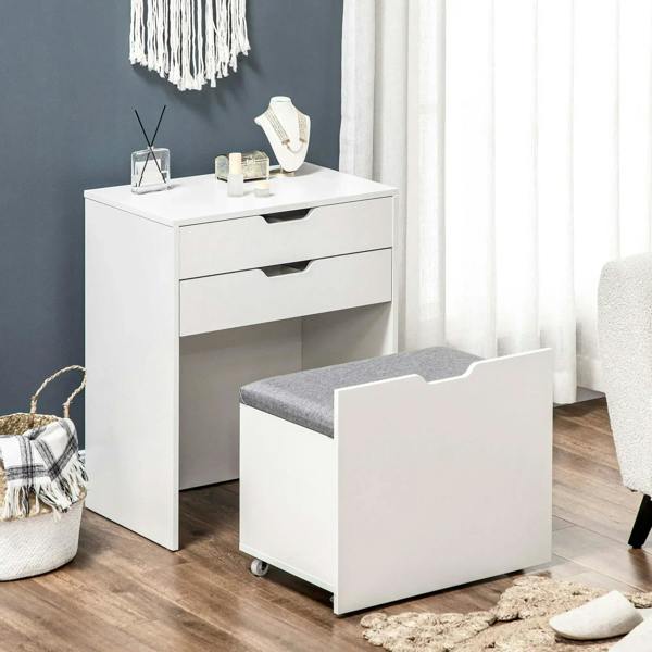 White vanity table with two drawers and flip-up mirror closed, plus gray storage stool