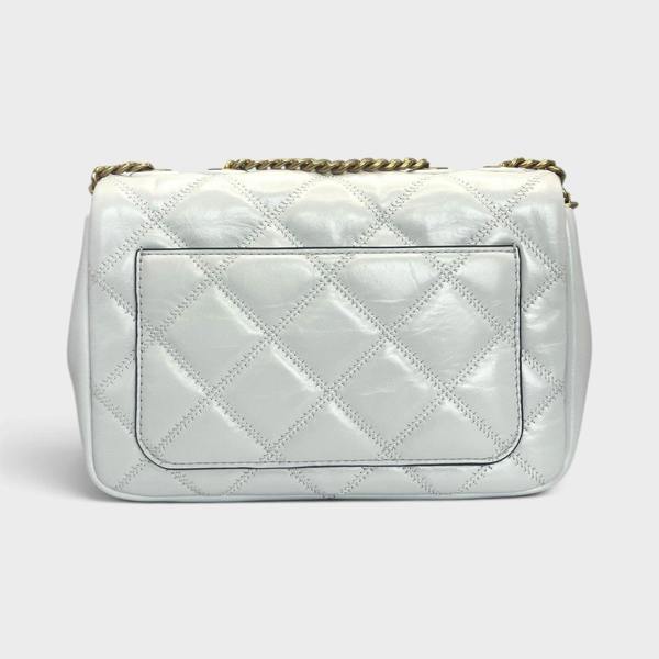 Supplied Fashion Willa small shoulder bag in white glazed quilted leather with a gold chain strap, back view.