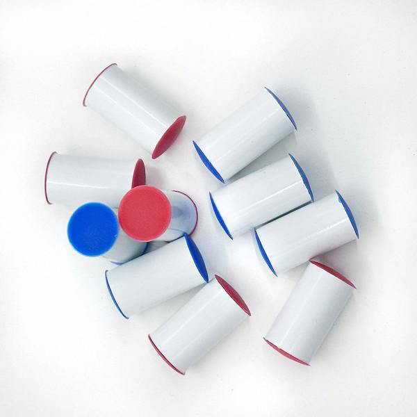 White Ski markers with red and blue ends on a white background